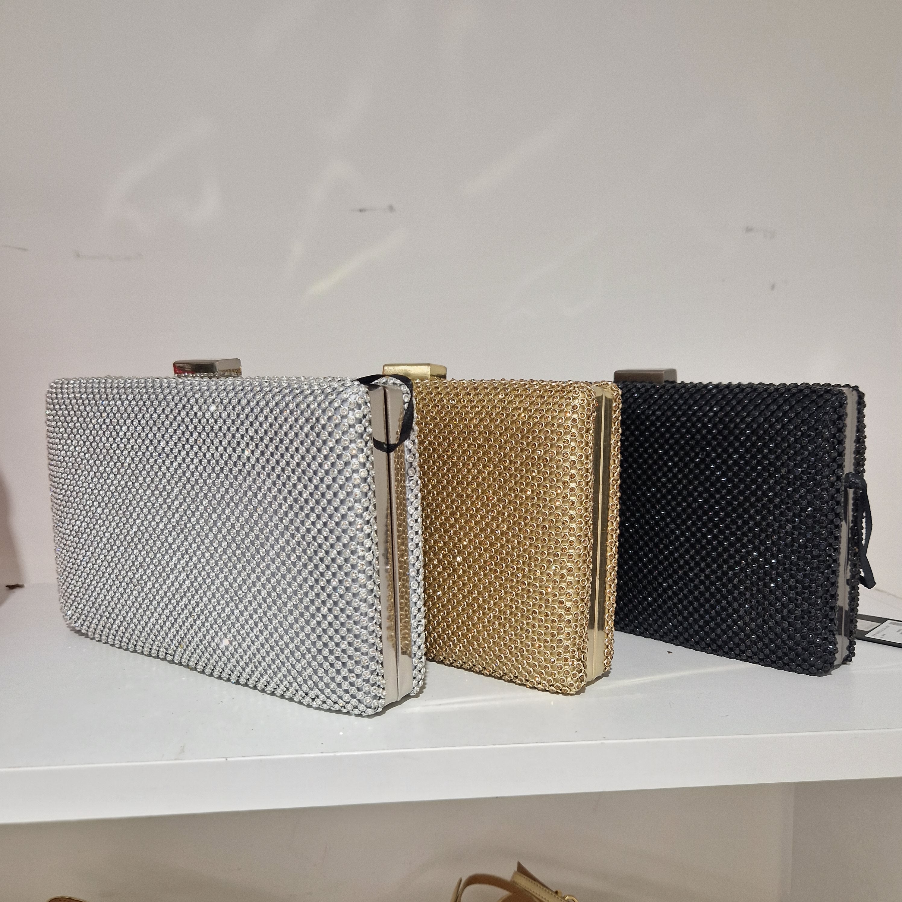 Borsa pochette in metallo  e strass modello ALAIA